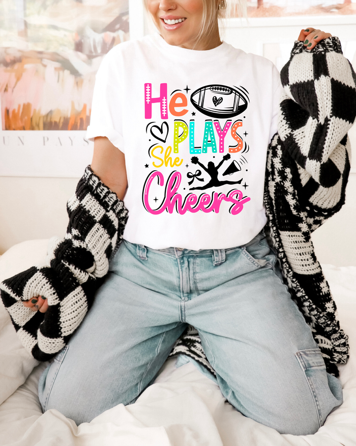 He Plays She Cheers